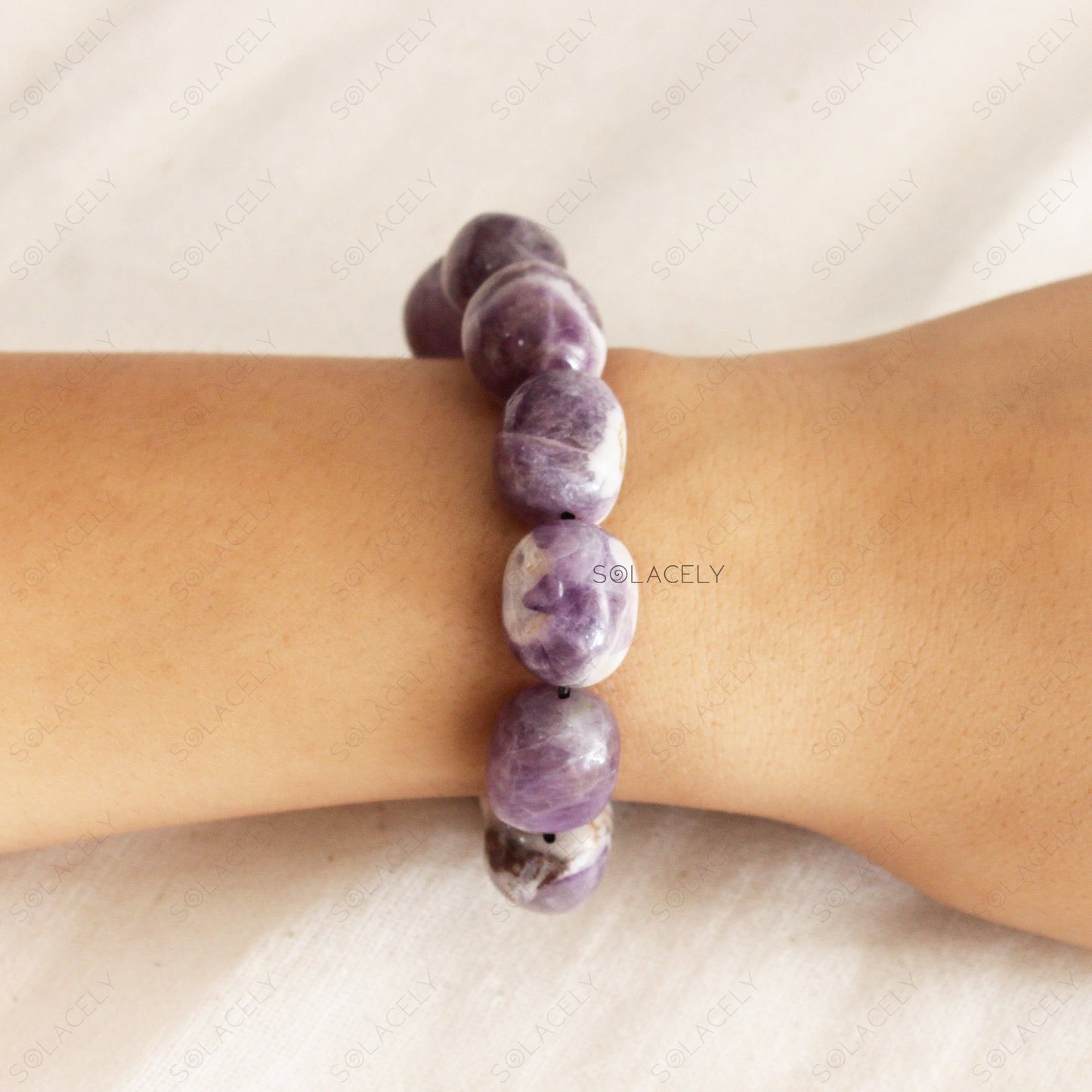 Amethyst Tumble Crystal Bracelet on wrist - Solacely