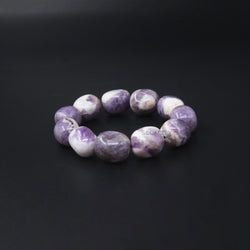 Amethyst Tumble Crystal Bracelet on black background