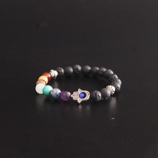 7 chakra lava stone bracelet with black background