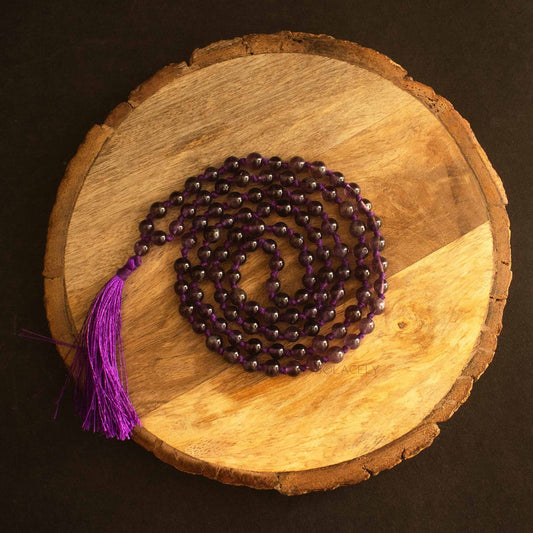 amethyst japmala with one guru bead