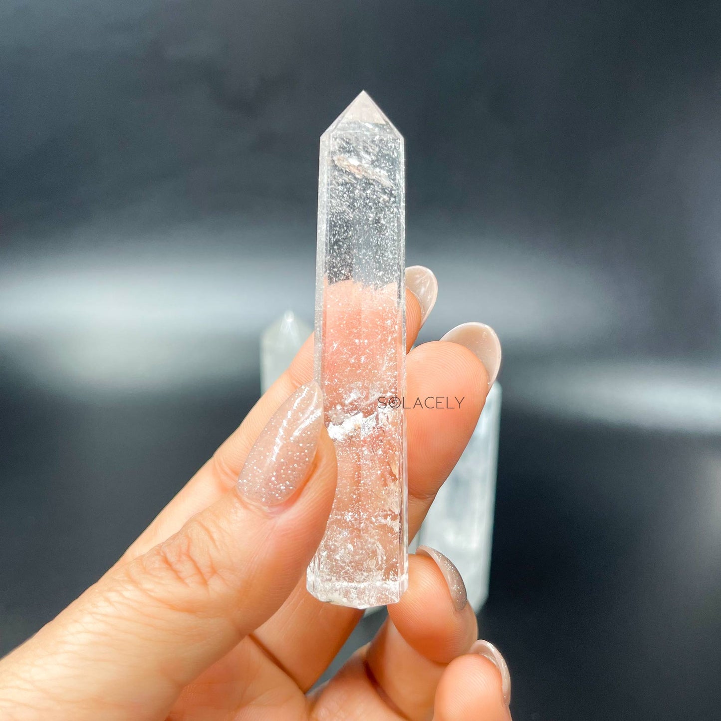 Clear quartz polished crystal point