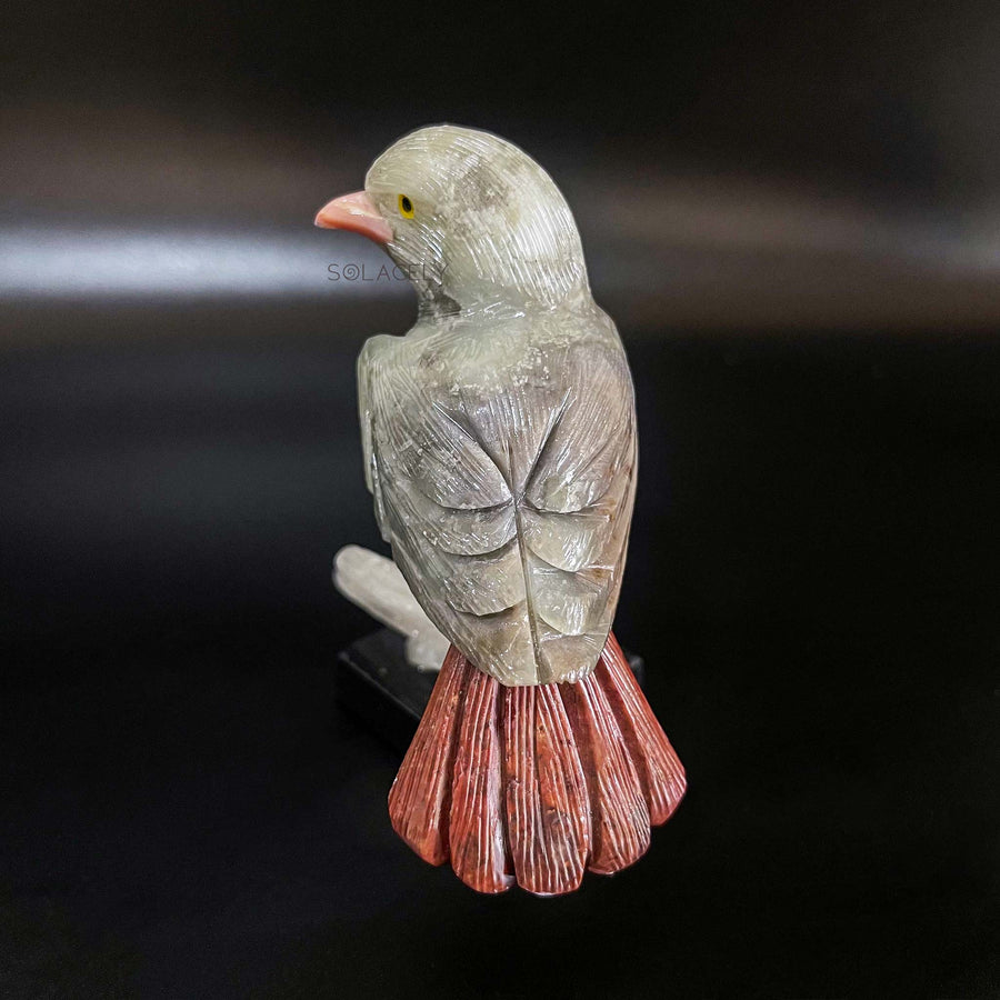 Handmade crystal bird on stone