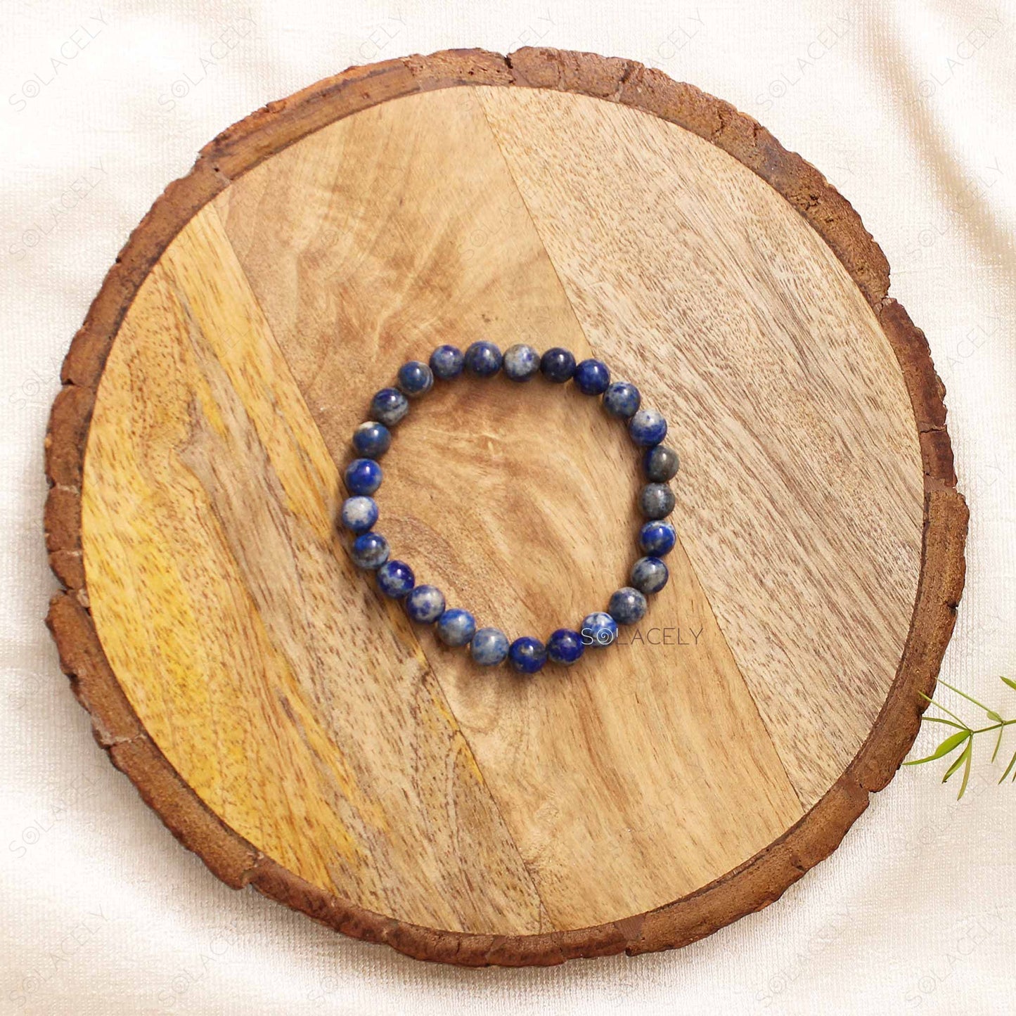 Lapis Lazuli Crystal Bracelet on wooden base