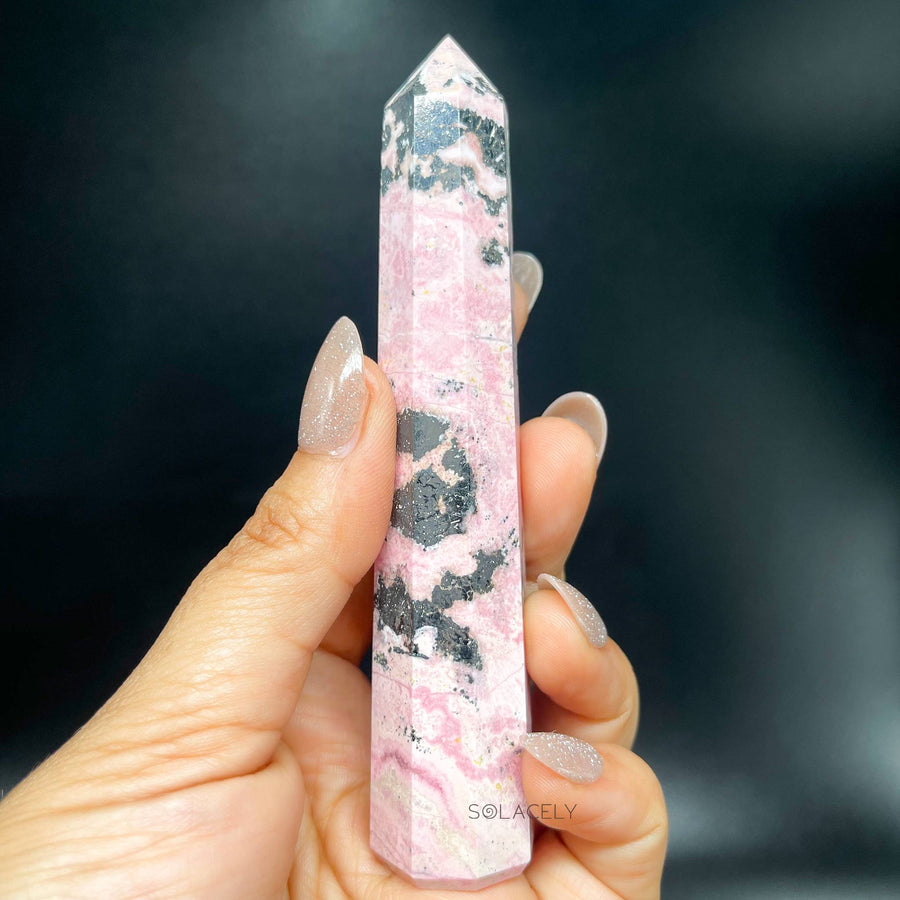 Natural rhodonite gemstone crystal tower