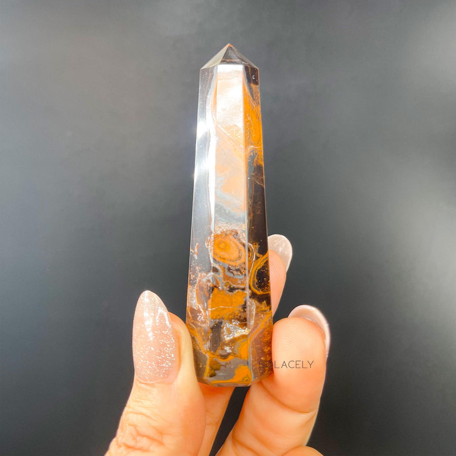 Natural tiger’s eye crystal point