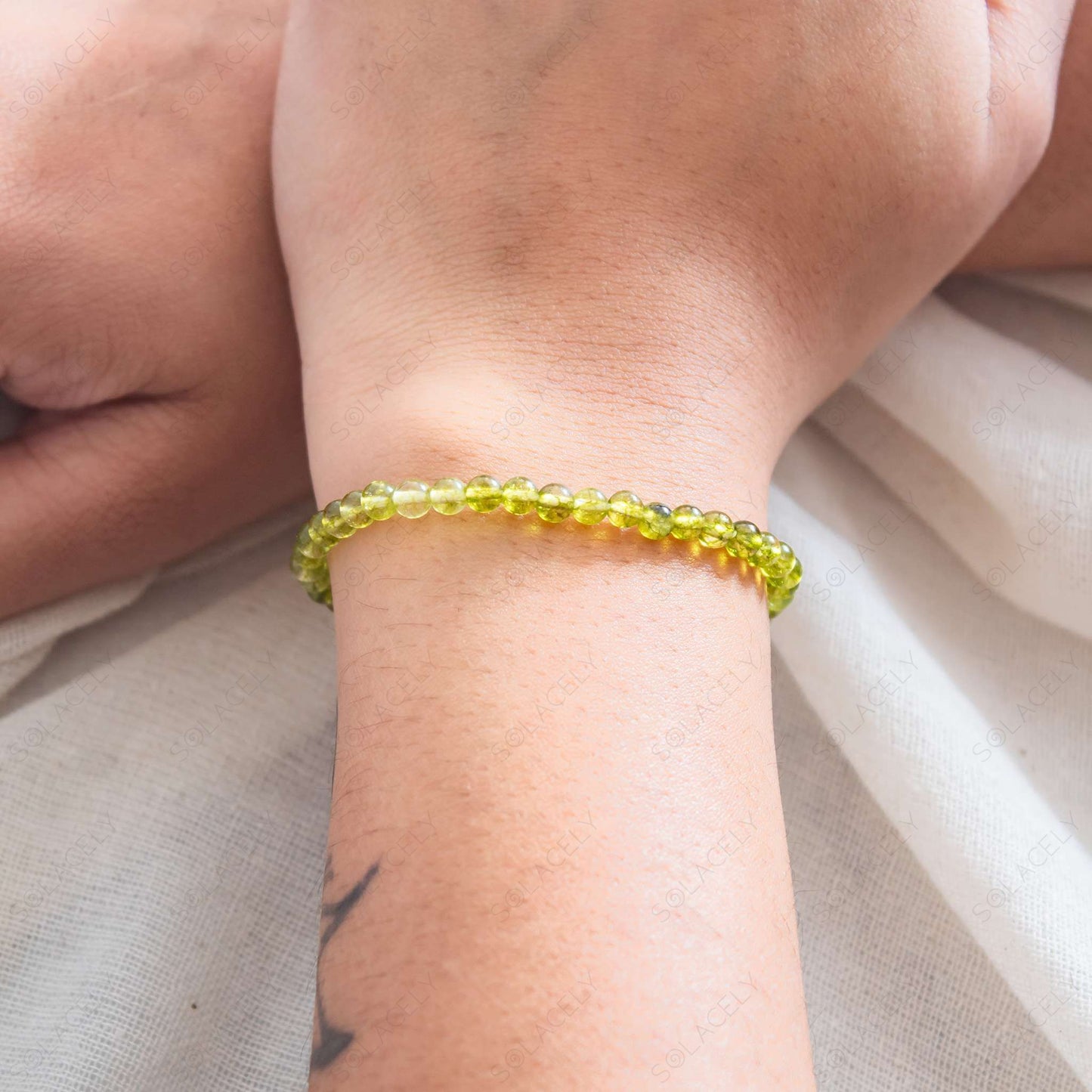 4mm peridot bracelet