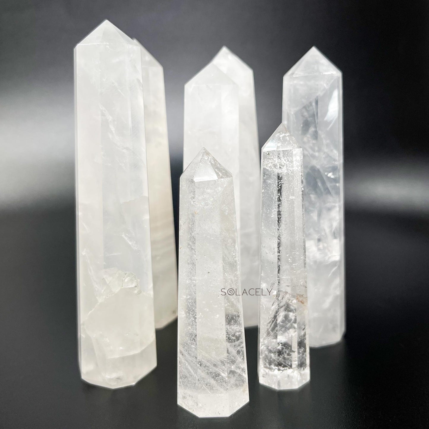 Polished clear quartz gemstone wand