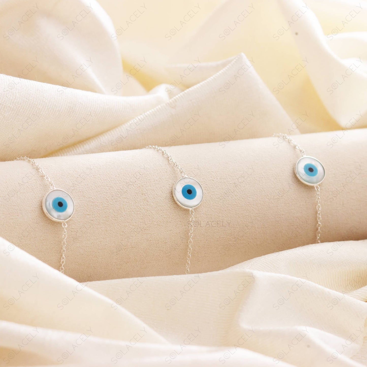 sterling silver bracelet with evil eye mother of pearl