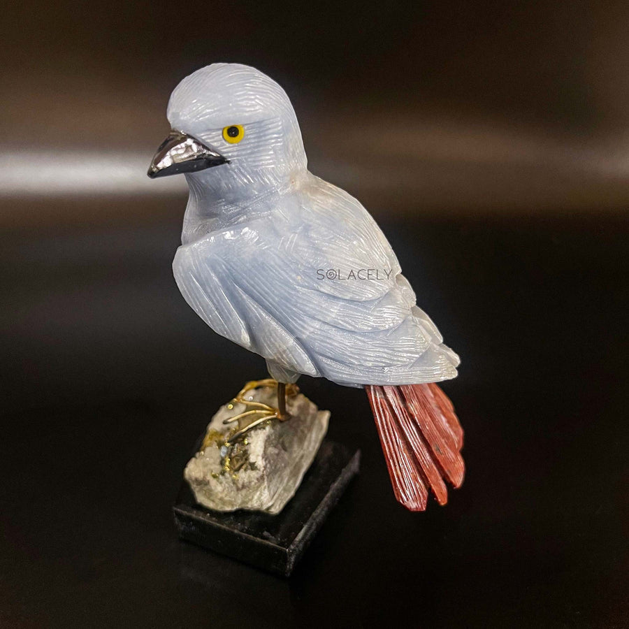 Stone base bird figure