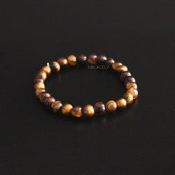 Tiger's Eye Crystal Beads Bracelet on black background