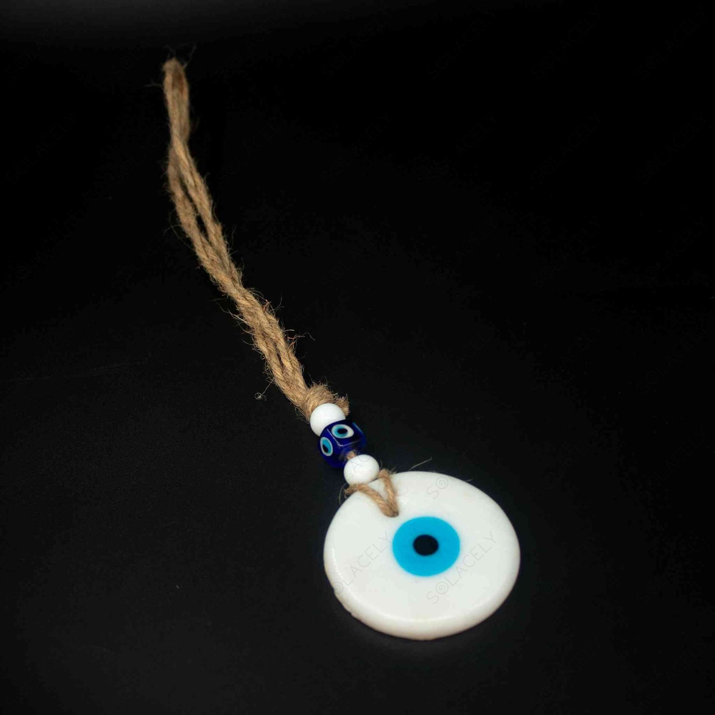 white evil eye hanging wall decor from protecting negative energy