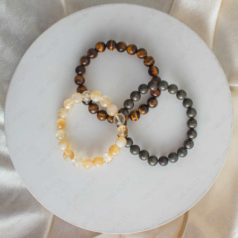 pyrite and citrine bracelets worn together