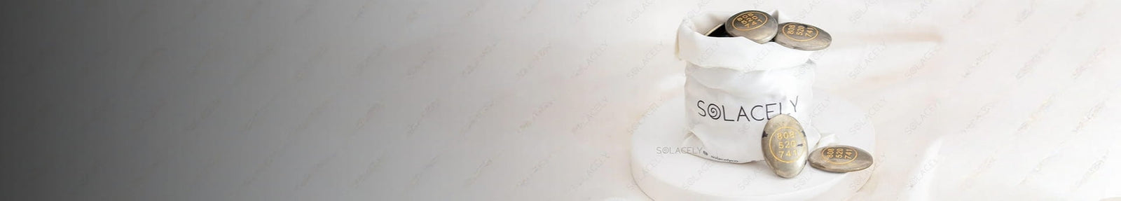 Solacely cabochon collection banner with polished domed stone coins in a Solacely pouch