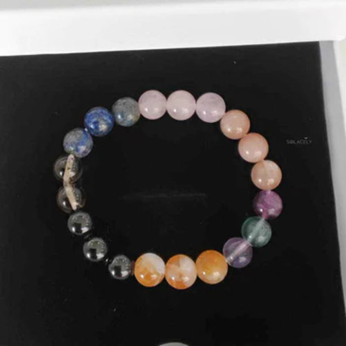 Multicolour gemstone bracelet on a dark background