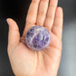 Glowing amethyst gemstone sphere