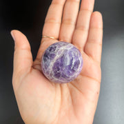 Glowing amethyst gemstone sphere
