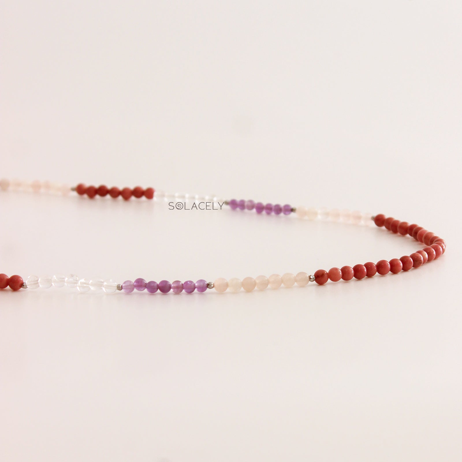 Necklace with red and purple beads