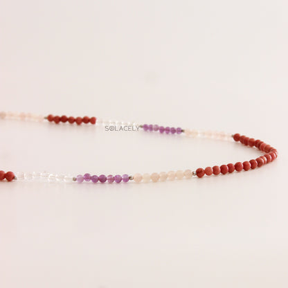 Necklace with red and purple beads