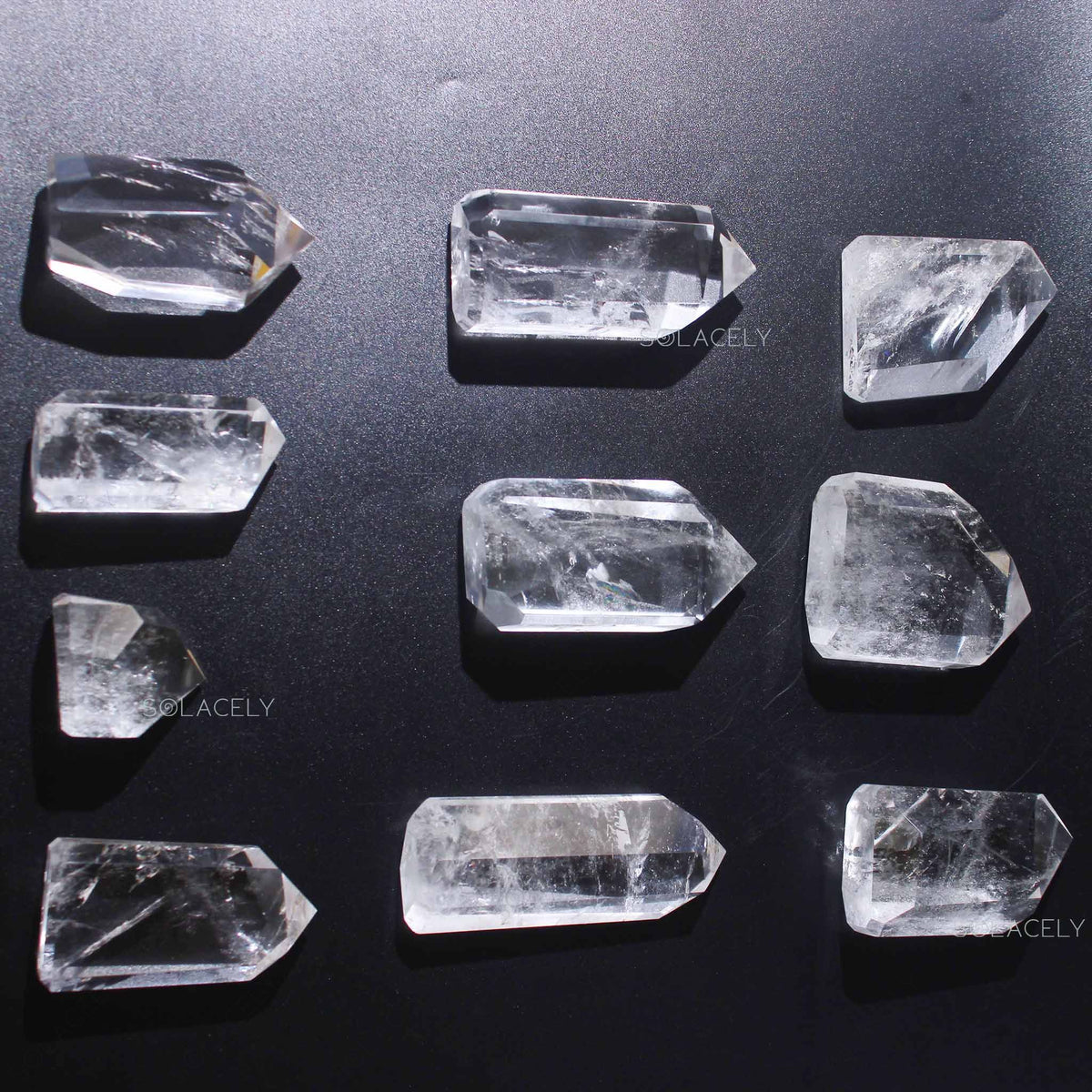 Polished clear quartz points collection