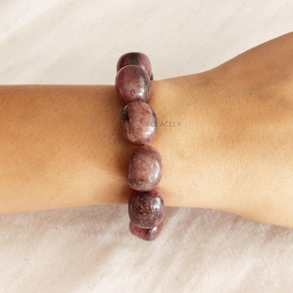 Strawberry Quartz Tumble Crystal Bracelet on wrist - Solacely