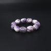Amethyst Tumble Crystal Bracelet on black background
