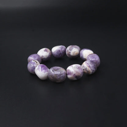 Amethyst Tumble Crystal Bracelet on black background