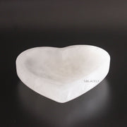 Selenite Heart Bowl on black background