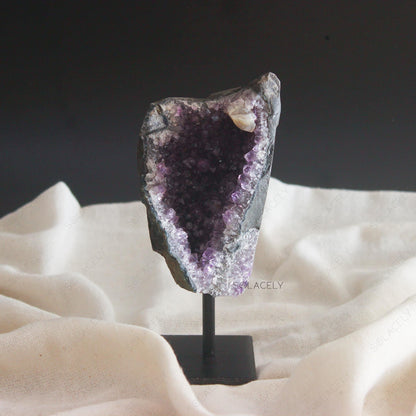 Crystal geode on display stand