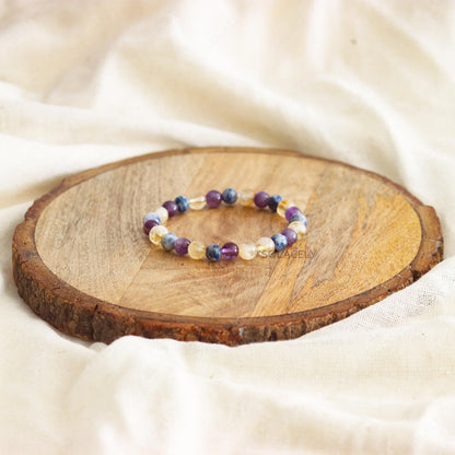 Anxiety and Stress Relief Bracelet on round wooden base