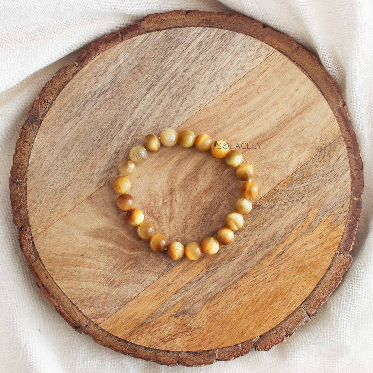 Cat's Eye Crystal Bracelet on wooden base