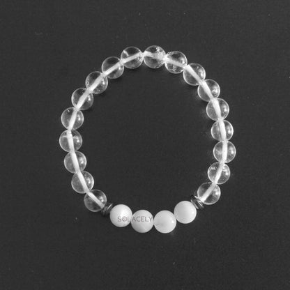Clear Quartz and Mother of Pearl Bracelet on black ground