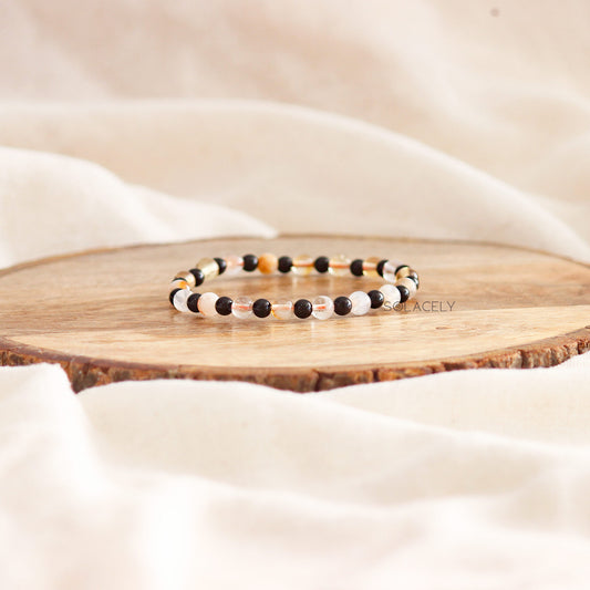Colorful beaded bracelet on wooden desk