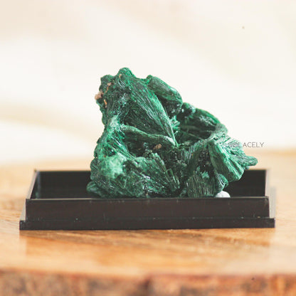 Raw Natural malachite on black base