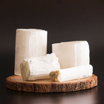 Polished Selenite Raw Stones on wooden base
