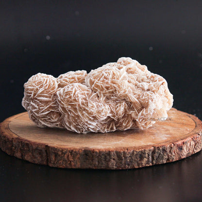 Selenite desert rose cluster on wooden base