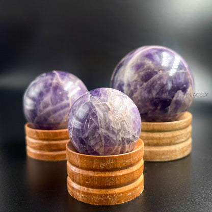Polished purple gemstone ball