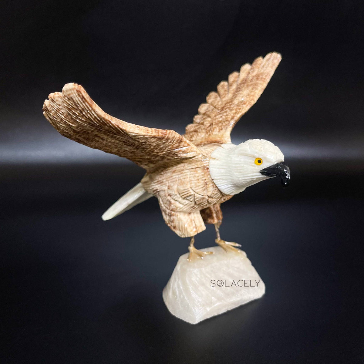 Bird decor on rock stand