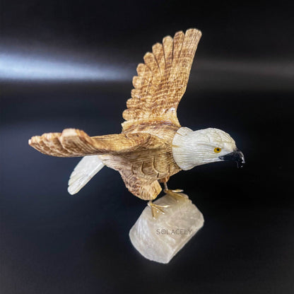 Bird figure on stone stand