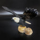 Bird statue on stone base