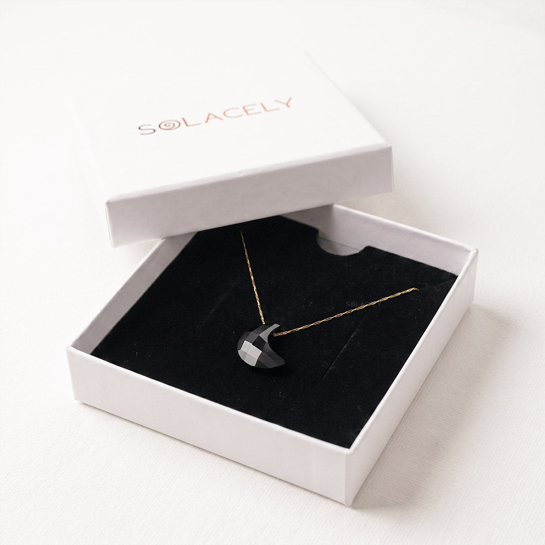 Black onyx crescent charm necklace