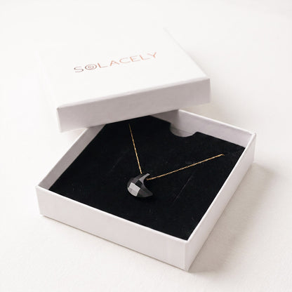 Black onyx crescent charm necklace