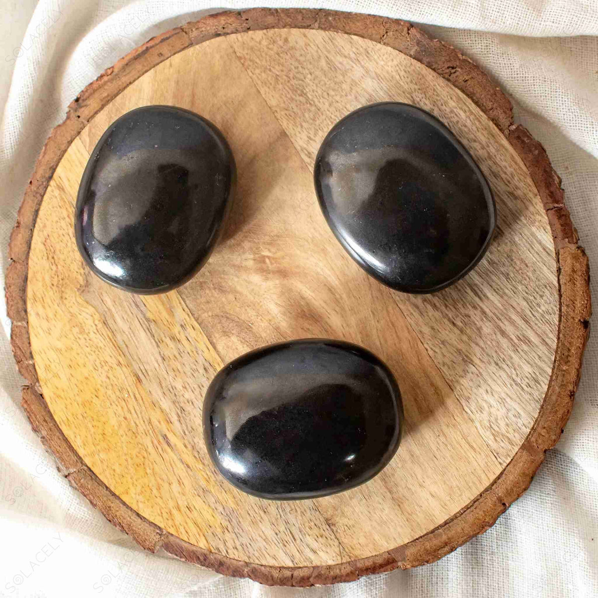 black tourmaline palm stone polished