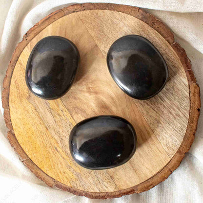 black tourmaline palm stone polished
