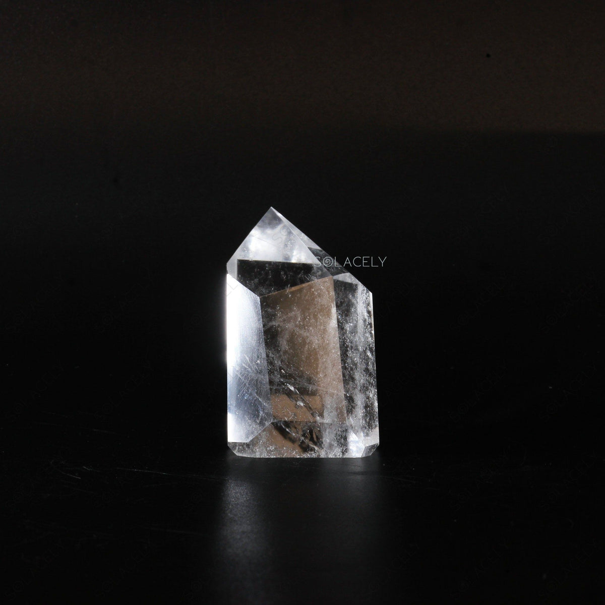 Clear Quartz Pointers on black background