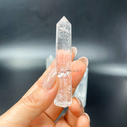 Clear quartz polished crystal point