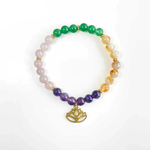 Purple and blue beaded bracelets with a silver heart charm