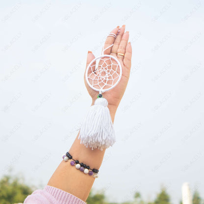 white dream catcher wall hang