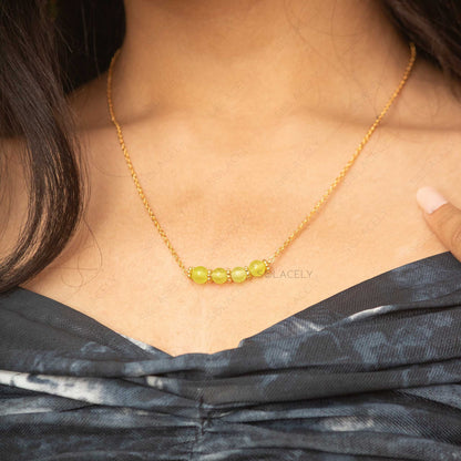 gold plated peridot necklace and earring set 