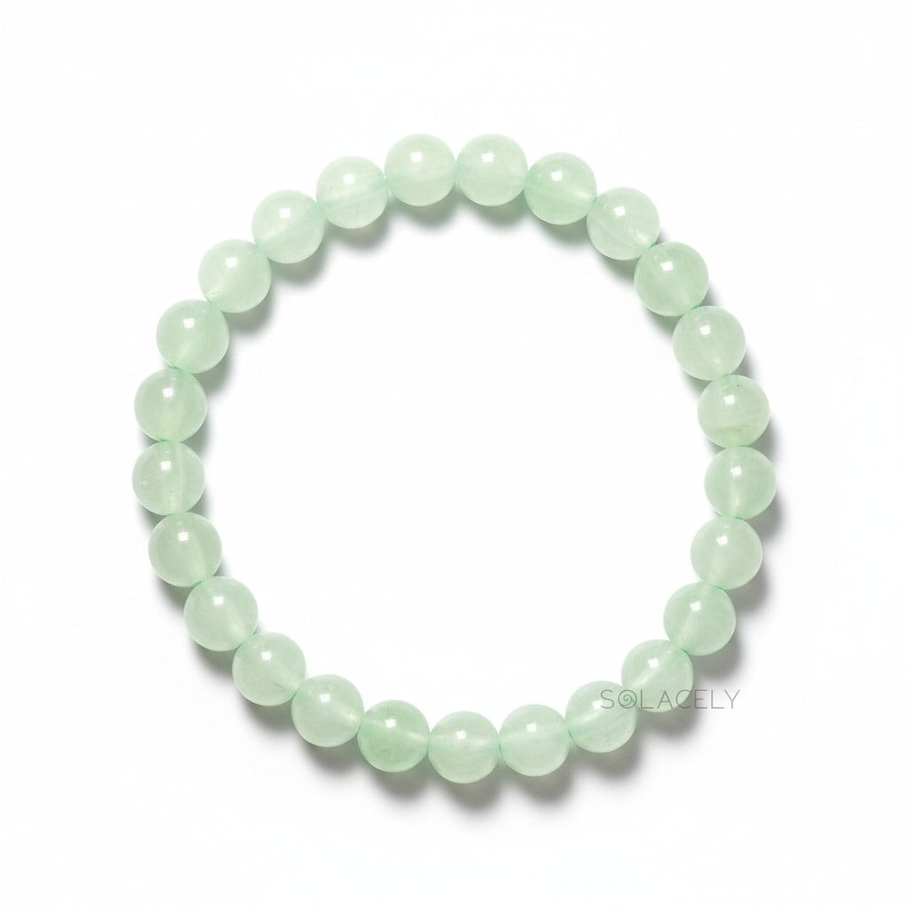6mm green aventurine crystal bracelet, layered on the wrist