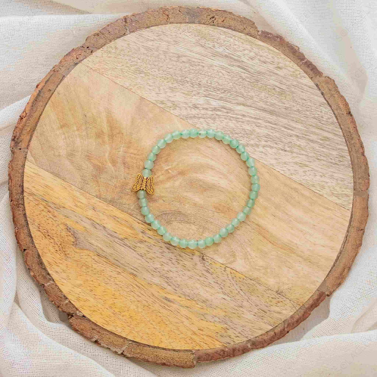 green aventurine bracelet with butterfly charm